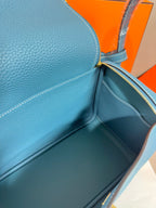 Hermes blue leather handbag inner panel with contrast lining and zipper edge