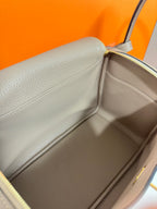 Hermes light gray leather handbag interior with smooth lining and open top edge
