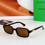 Bvlgari sunglasses: tortoiseshell frames with brown lenses and gold-tone accents.