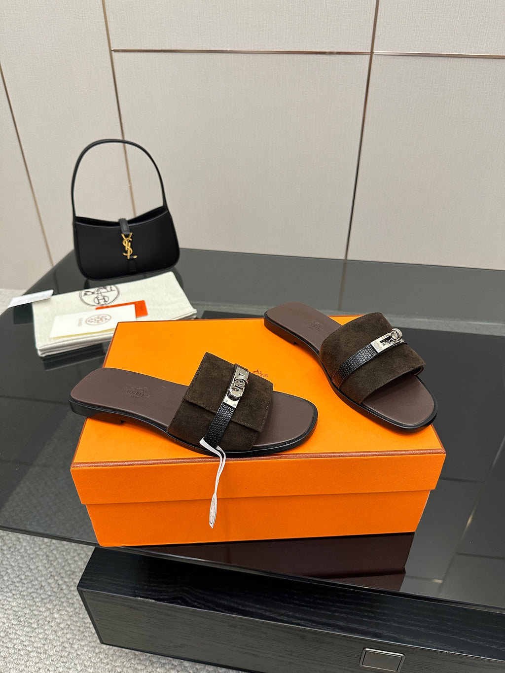 Ladies’ suede slide sandals with dark straps and silver buckle, flat open-toe