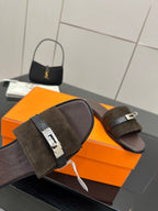 Ladies’ suede slide sandals with silver buckle strap and textured foot strap detail