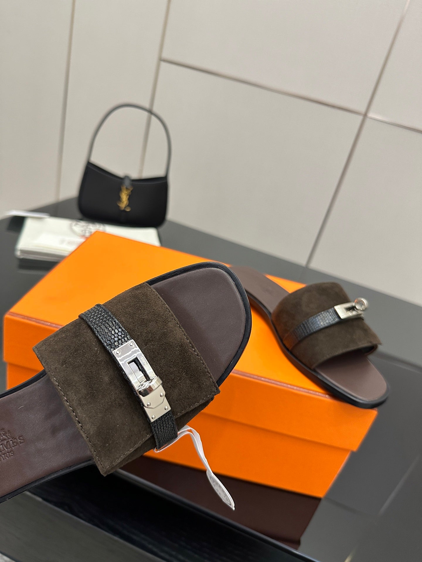 Ladies’ suede slide sandals with silver buckle strap and textured foot strap detail