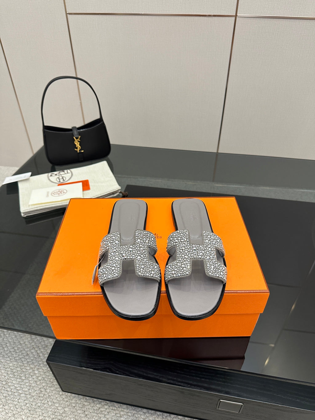 Women's rhinestone slide sandals, gray footbed with sparkling buckle detail
