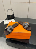 Hermes ladies slide sandals, black and silver rhinestone strap across the foot