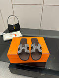 Hermes ladies slide sandals, black with silver rhinestone H buckle on top