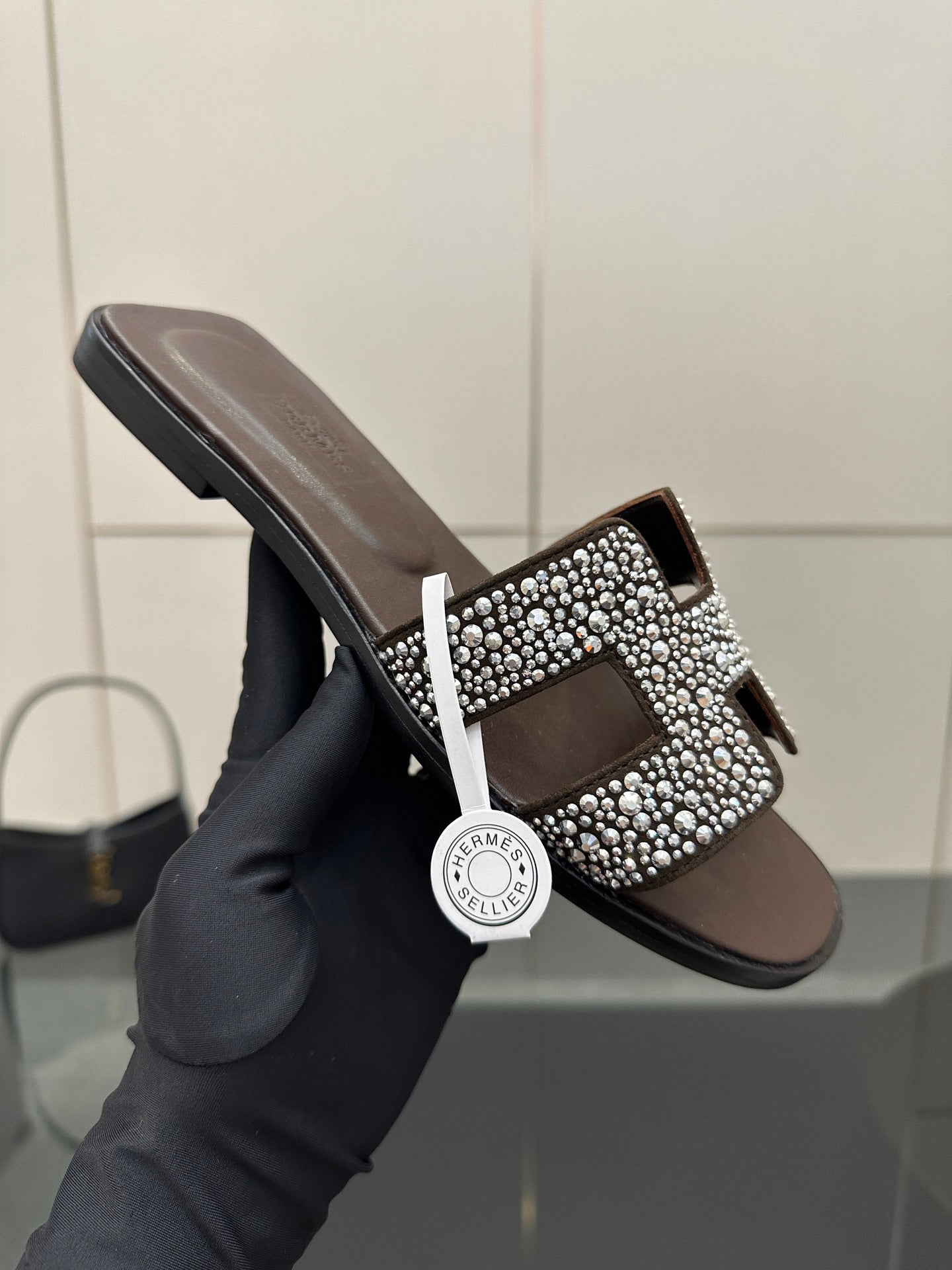 Hermes ladies slide sandal, black rubber sole with silver rhinestone H buckle top