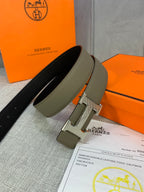 Reversible leather belt with black and olive straps, silver H buckle