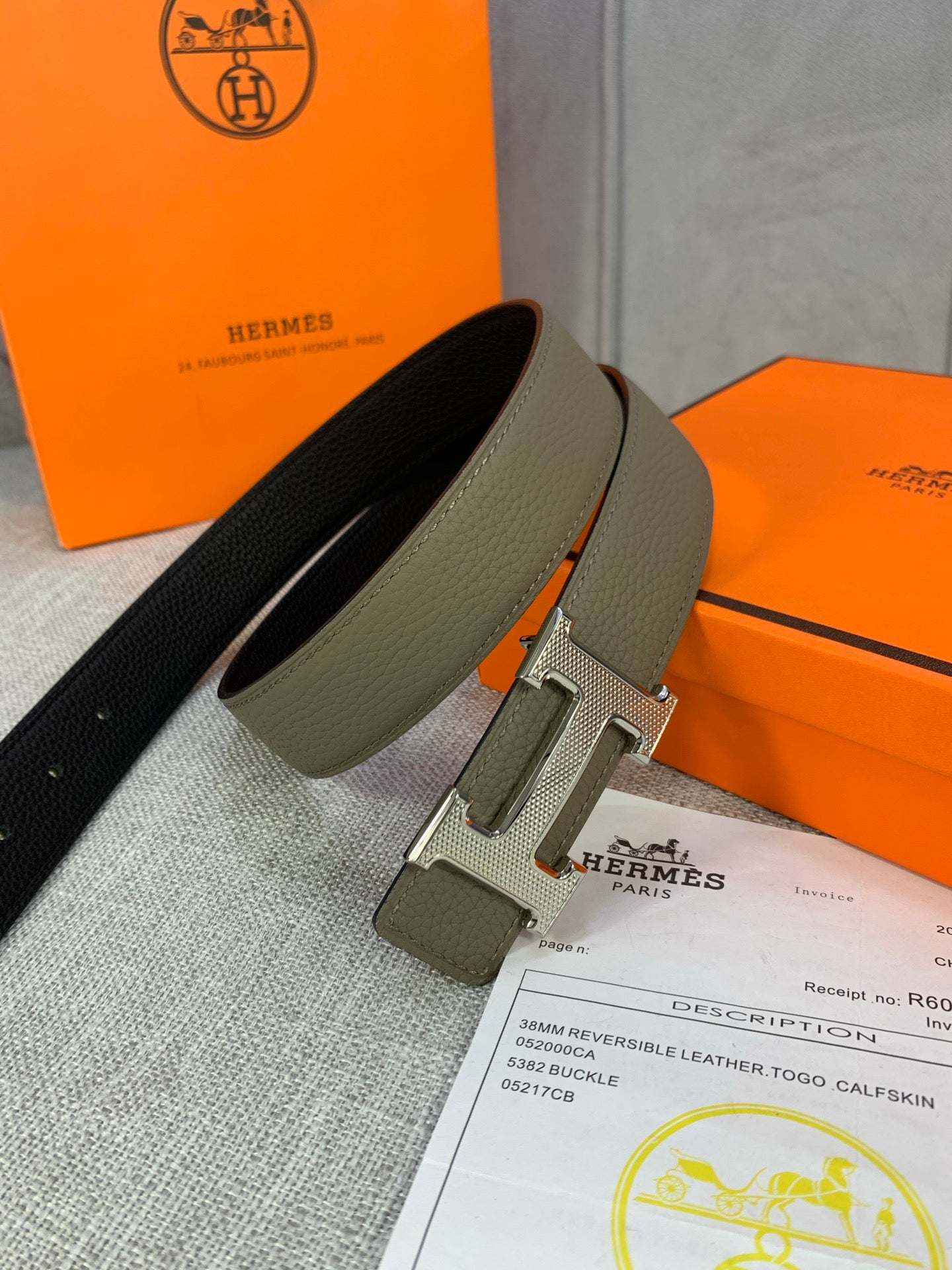 Reversible leather belt with black and olive straps, silver H buckle