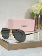 Celine glasses, gold-tone metal sunglasses with dark tinted lenses