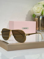 Celine glasses, gold-tone metal sunglasses with deep tinted lenses