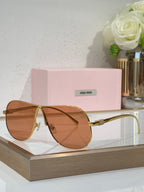Celine glasses, gold-tone metal sunglasses with warm brown tinted lenses