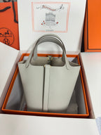 Hermes pale gray tote bag with gold-tone clasp, in presentation box