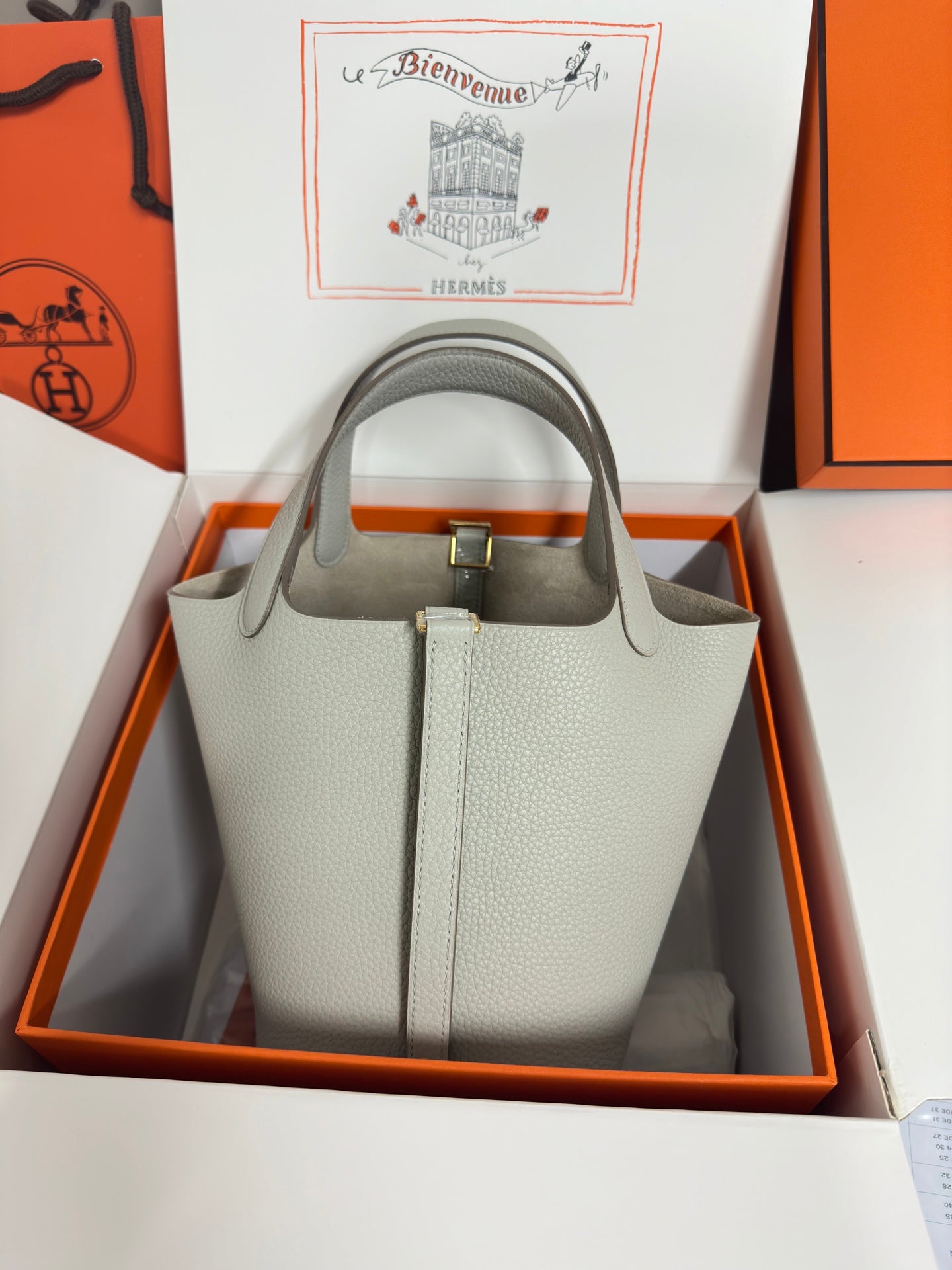 Hermes pale gray tote bag with gold-tone clasp, in presentation box