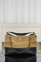 Bicolor quilted shoulder bag with chain strap, gold-tone logo, black top and sides