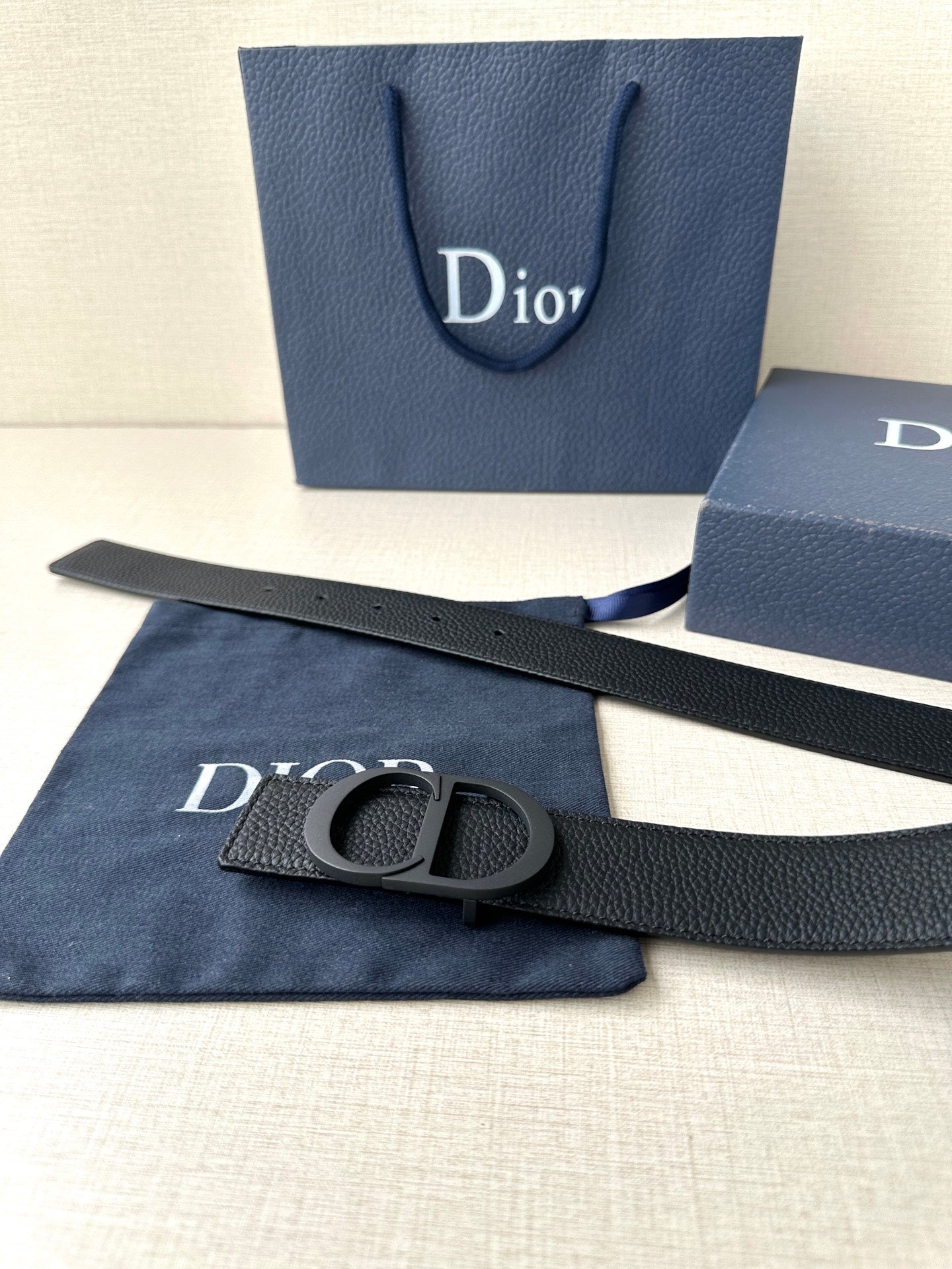 Black leather Dior belt with CD buckle and extended strap
