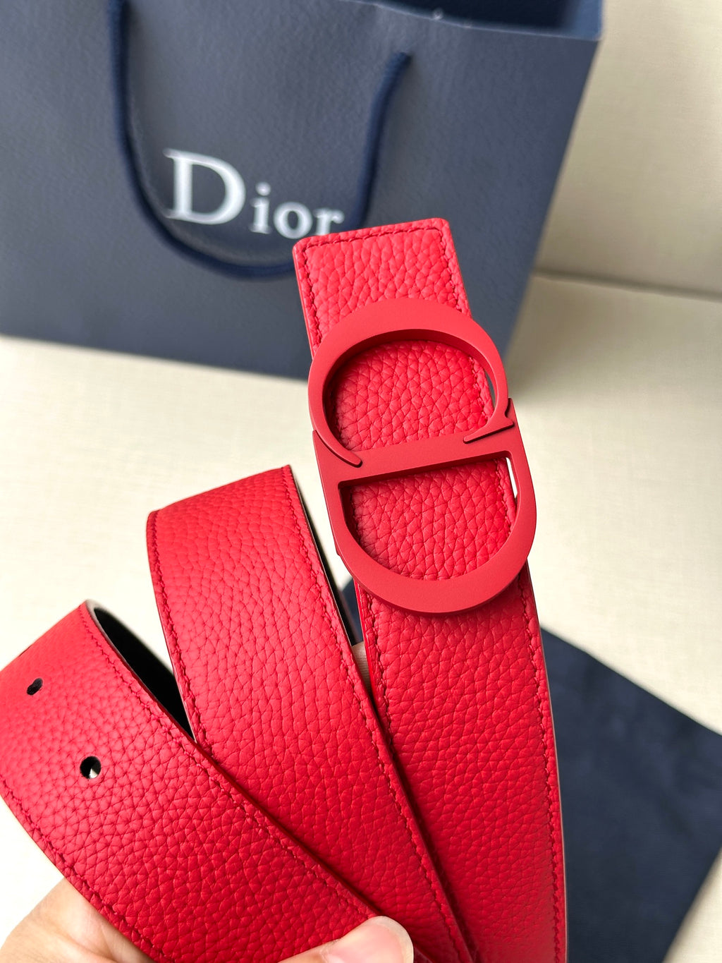 Red leather belt with Dior D-buckle and adjustable strap holes