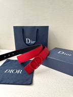 Red leather Dior belt with D buckle beside box and dust bag