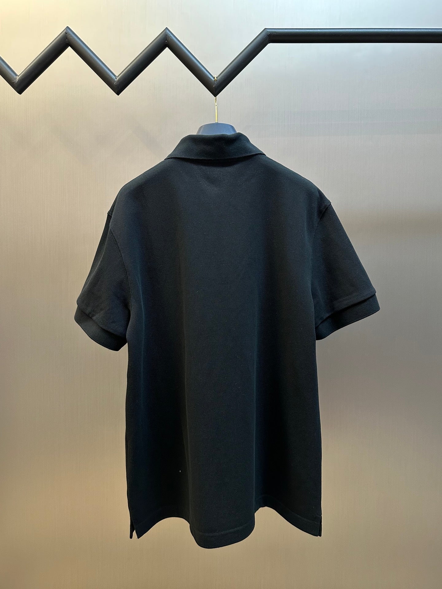 Prada dark short-sleeve polo shirt, back view