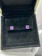Purple clover stud earrings in dark velvet Van Cleef & Arpels box