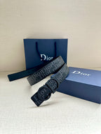 Navy Dior logo belt with rectangular buckle and dark monogram strap