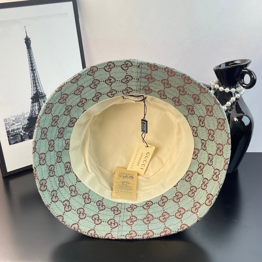 Bucket cap inside view showing cream lining and two hanging tags
