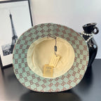 Bucket cap inside view showing cream lining and two hanging tags