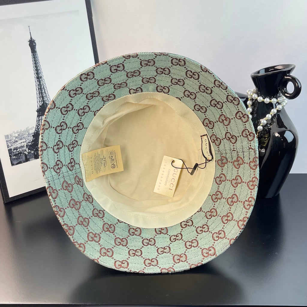 Bucket cap inside view with cream lining and brand tags on the crown