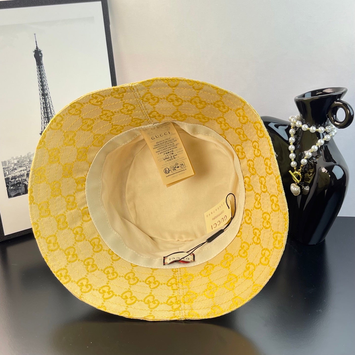Gucci cap with yellow GG pattern, inside view showing beige interior