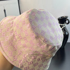 Pink Gucci GG monogram bucket hat side view with stitched crown panel