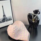 Pink Gucci GG monogram bucket hat angled view with curved brim