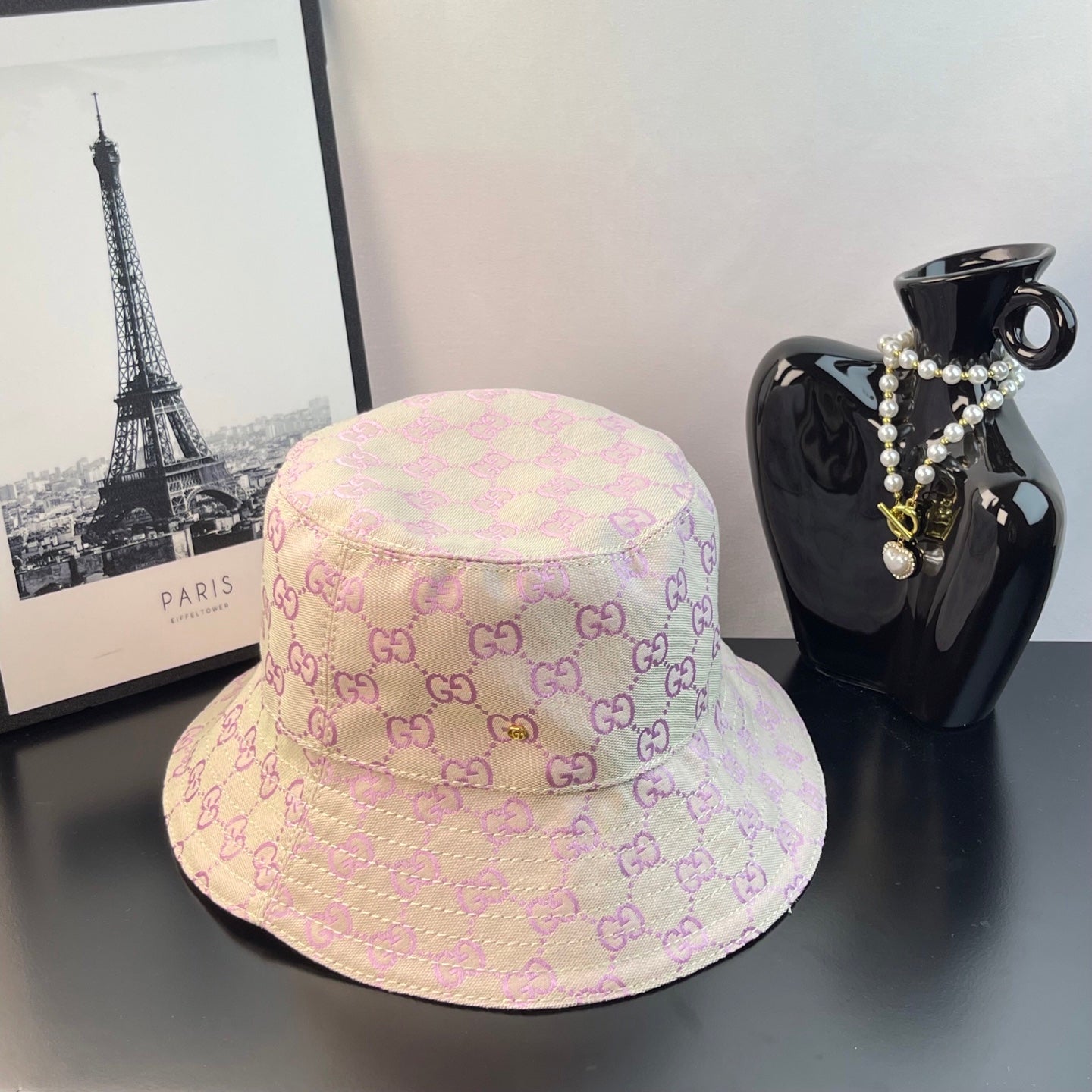 Gucci monogram bucket hat in pink with GG pattern and curved brim