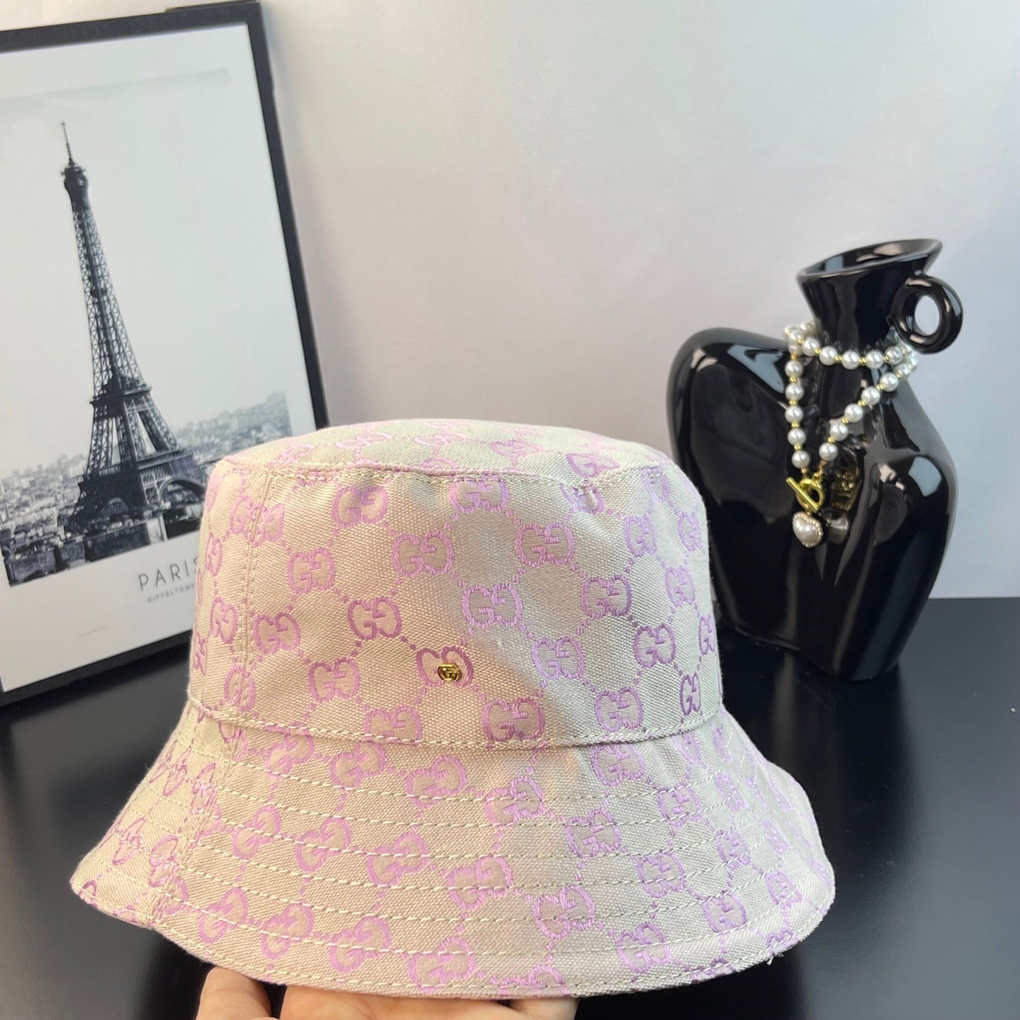 Pink Gucci GG monogram bucket hat back view with curved, stitched brim
