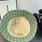 Gucci GG monogram bucket hat inside view, light green outer fabric with liner