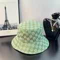 Gucci GG monogram bucket hat in light green with all-over patterned fabric