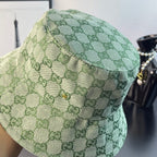 Gucci GG monogram bucket hat in light green, close-up of stitched brim edge