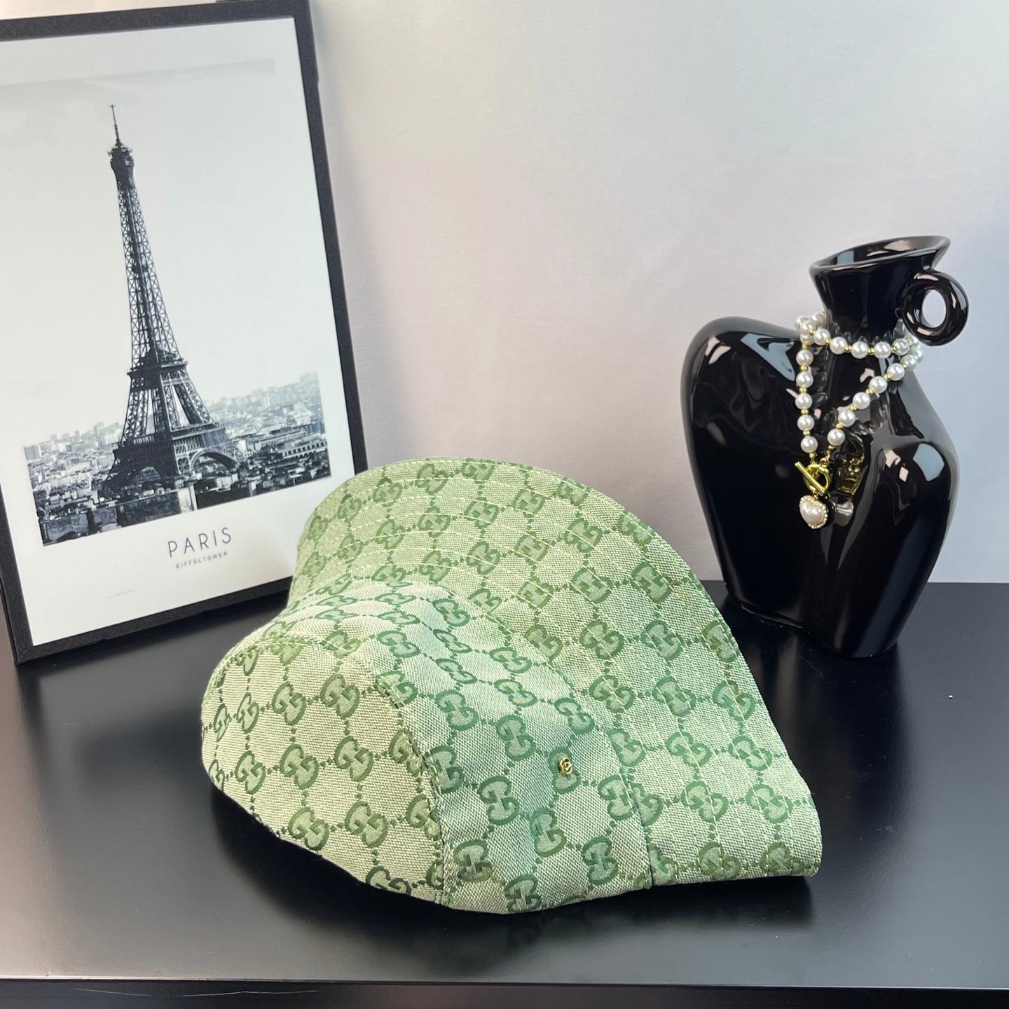 Gucci GG monogram bucket hat in light green, side profile with wide brim