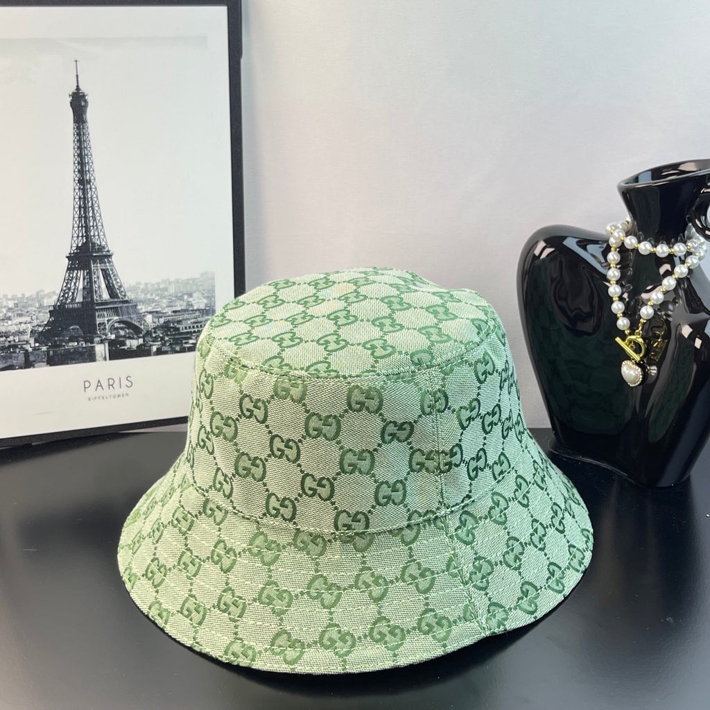 Gucci GG monogram bucket hat, light green with wide brim and patterned exterior