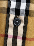Plaid shirt with round button on front placket