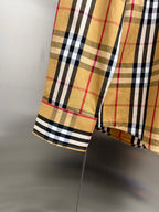 Plaid shirt sleeve hem with stitched cuff