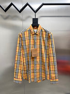 Plaid button-up shirt with long sleeves, front button placket and collar