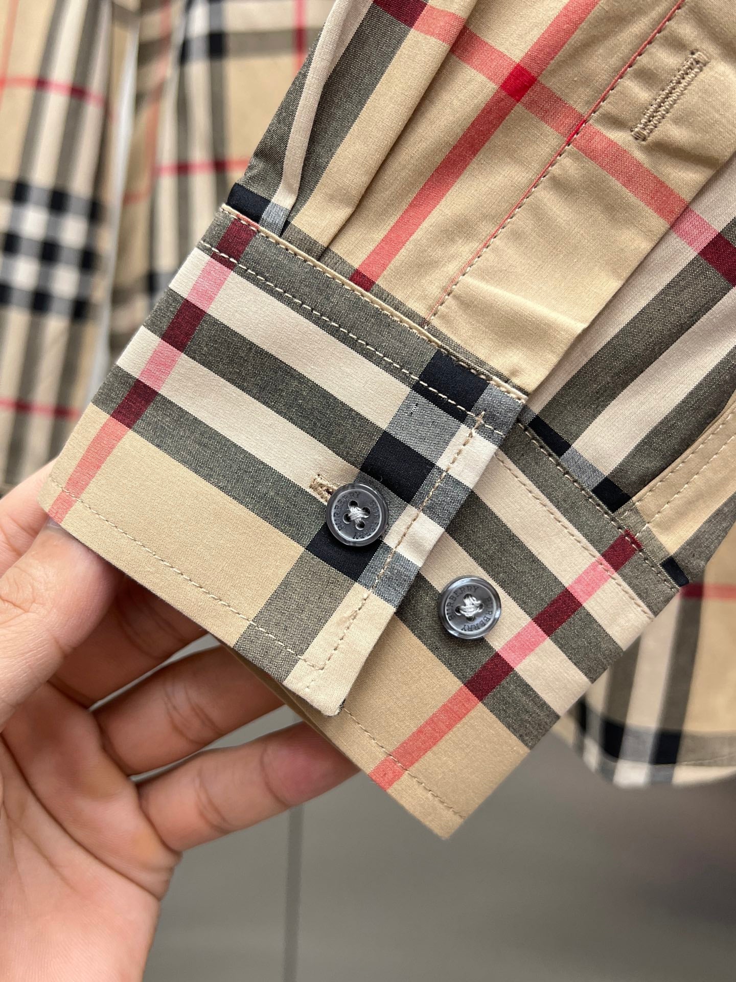 Burberry long plaid shirt cuff with button tabs