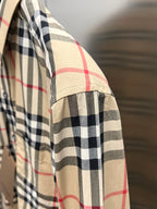 Burberry plaid long-sleeve shirt with stitched hem panel, side view