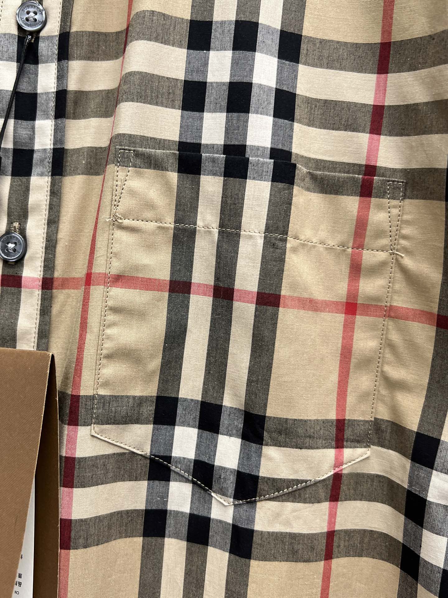 Burberry plaid long-sleeve shirt front pocket and button placket detail