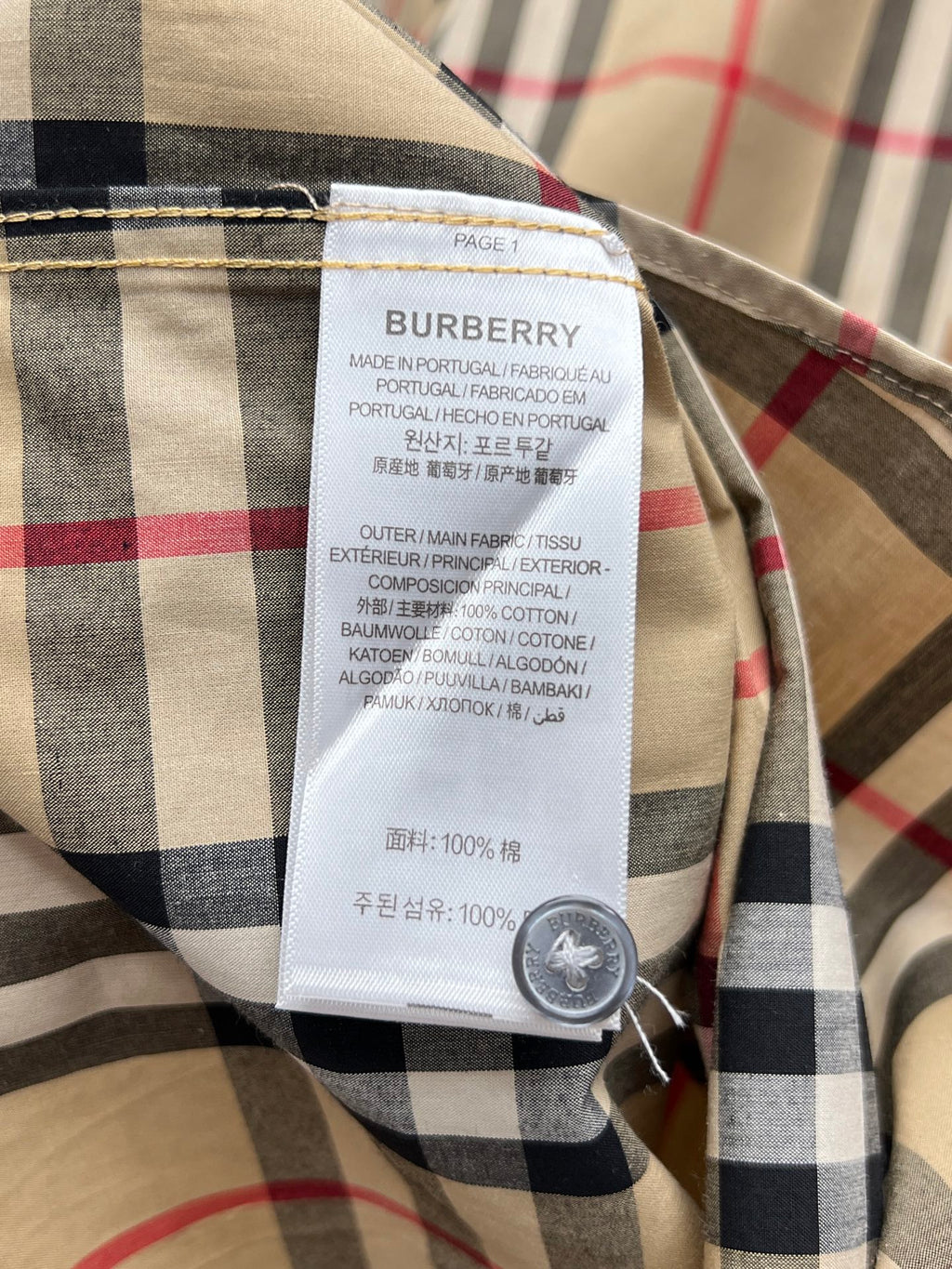 Burberry long plaid garment care label and fabric details