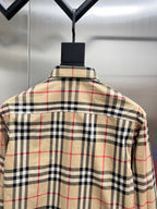 Burberry long plaid garment back on hanger