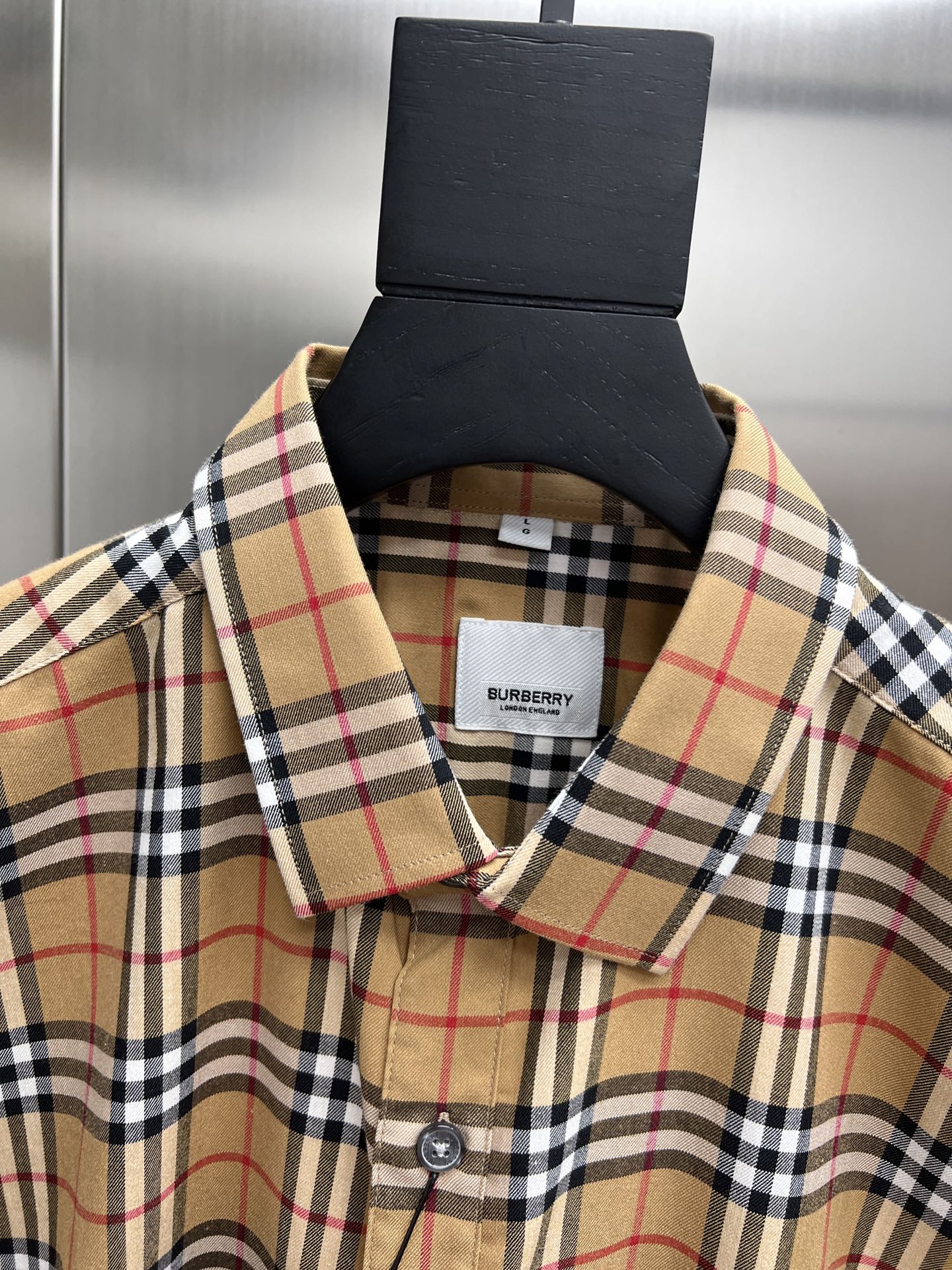 Burberry check button-up shirt collar detail with button placket