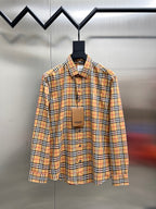 Burberry check button-up shirt with long sleeves, button front and collar