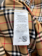 Burberry plaid shirt neck label with care and fabric composition text