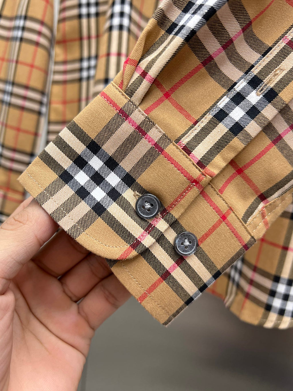 Beige plaid long-sleeve shirt cuff with two button placket
