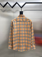 Burberry check button-up shirt with long sleeves, back view on hanger